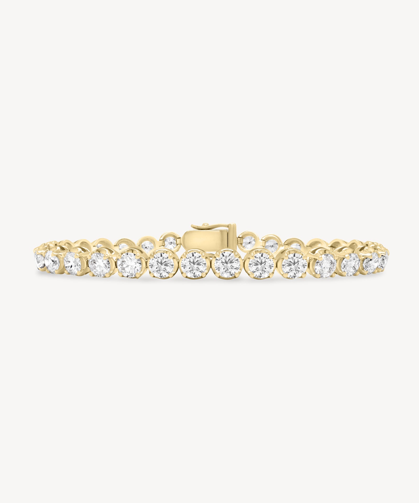 Round Cut Diamond Tennis Bracelet in Enlargement Setting