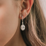 Oval and Baguette Cut Diamond Huggie Halo Drop Earrings