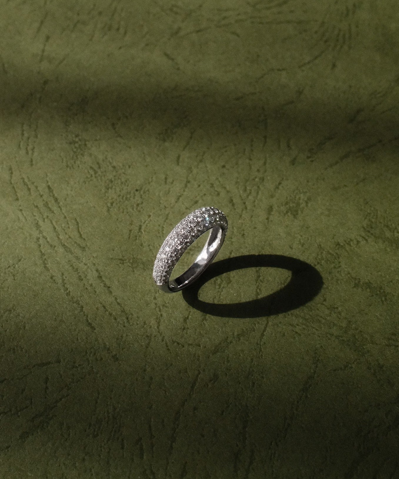 Micro pavé dome lab grown diamond half eternity ring in 18K white gold from tinxx.