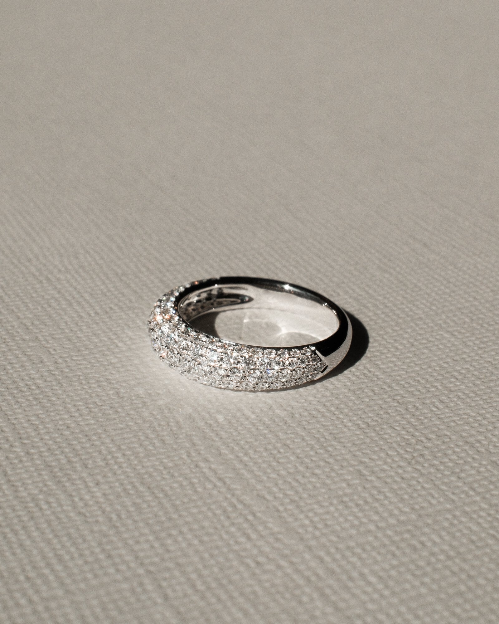 Micro pavé dome lab grown diamond half eternity ring in 18K white gold from tinxx.