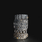 Stack of lab-grown diamond eternity rings in 18K white gold, photographed on a black background