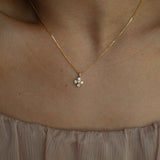 XO diamond pendant necklace in yellow gold worn on neck – tinxx jewelry